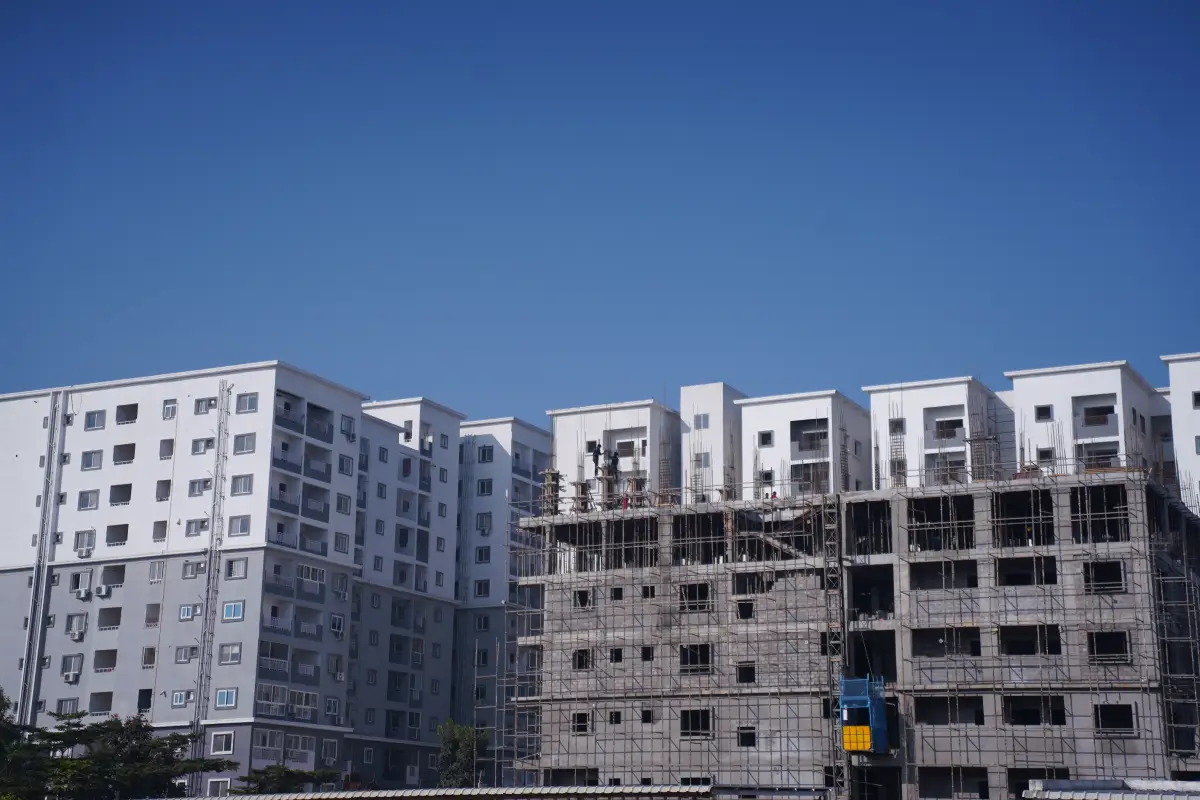 Assisted living for seniors in Kukatpally Hyderabad Telangana — caregiver attending elderly resident in facility courtyard